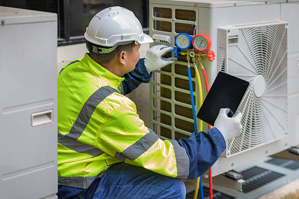 Professional Heat Pump Repair technician working in Kingston, MO